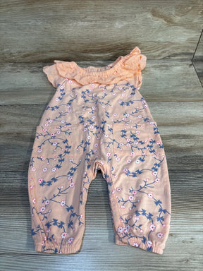 Pink floral baby romper with ruffled sleeves and snap closures, ideal for infants and toddlers.