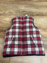 Front view of Janie and Jack reversible tartan puffer vest in red plaid with zip front and pockets on a wood background