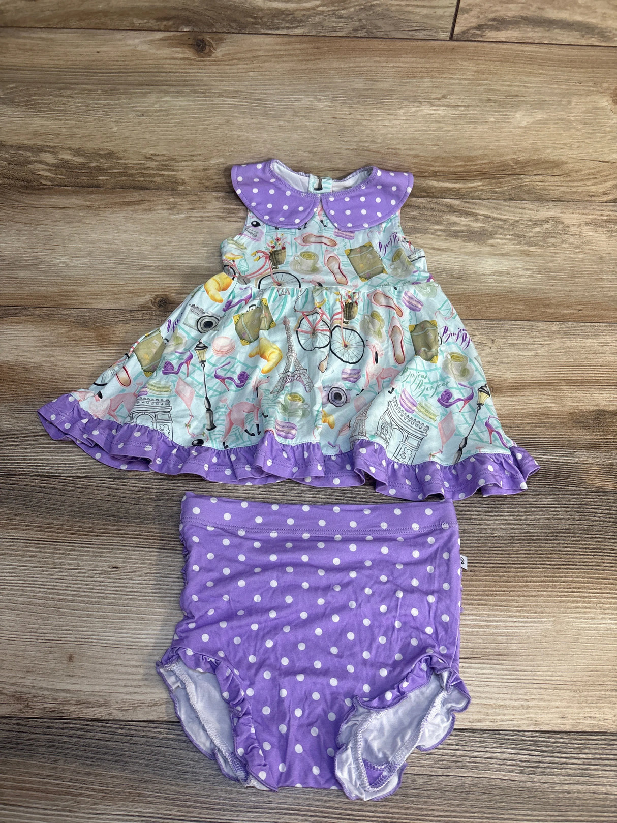 Girls' sleeveless Paris-themed dress with matching purple polka dot bloomers set