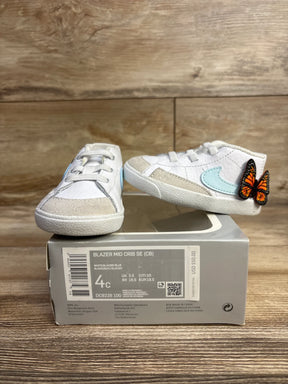 White and glacier blue Nike Blazer Mid Crib SE baby shoes with butterfly detail on box