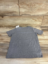 Gray kids t-shirt from The Children's Place, laid flat on wood floor, ideal for baby or toddler clothing resale