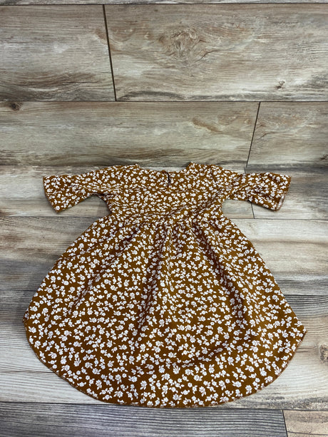 Front view of Bailey’s Blossoms brown floral dress in size 3T showcasing a gathered waist and full skirt on a wood floor
