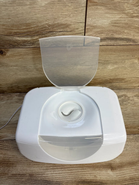 White baby bottle warmer with open lid on wood surface, ideal for maternity and baby gear