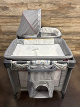 Baby Trend Nursery Den Playard with Rocking Cradle - Daisy Pink