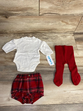 Carter's baby outfit with white bodysuit, red plaid shorts, and red ribbed tights on wood floor