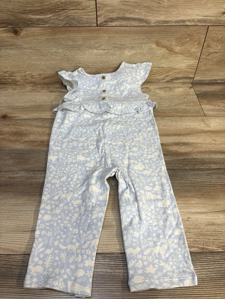 Light blue toddler romper with white floral print, ruffle sleeves, and wooden buttons