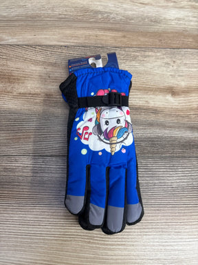 Blue children's winter glove with colorful unicorn print, adjustable wrist strap, and gray fingertips on wooden surface