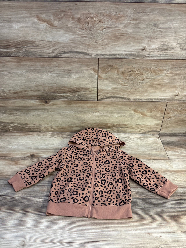 Flat lay of Cat and Jack toddler full-zip leopard print hooded jacket showing zipper and cuff details on light wood background size 12 months