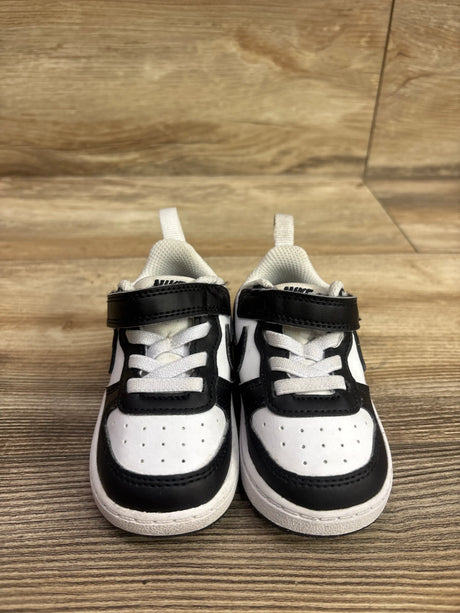 Front view of Nike Court Borough Low Recraft TD sneakers in black and white with perforated toe boxes and black straps