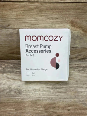 Front view of Momcozy double-sealed flange box (27mm) showing checked 27mm size indicator on wooden background