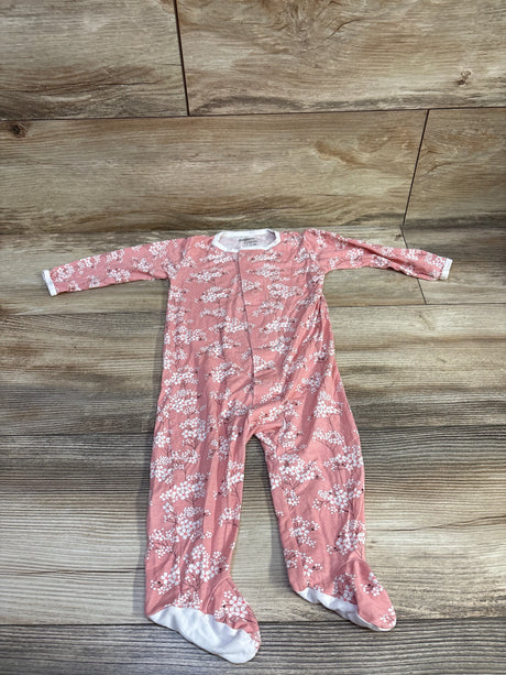 Front view of Magnetic Me Modal Cherry Blosson footie, pink floral print with white cuffs, on wood flooring