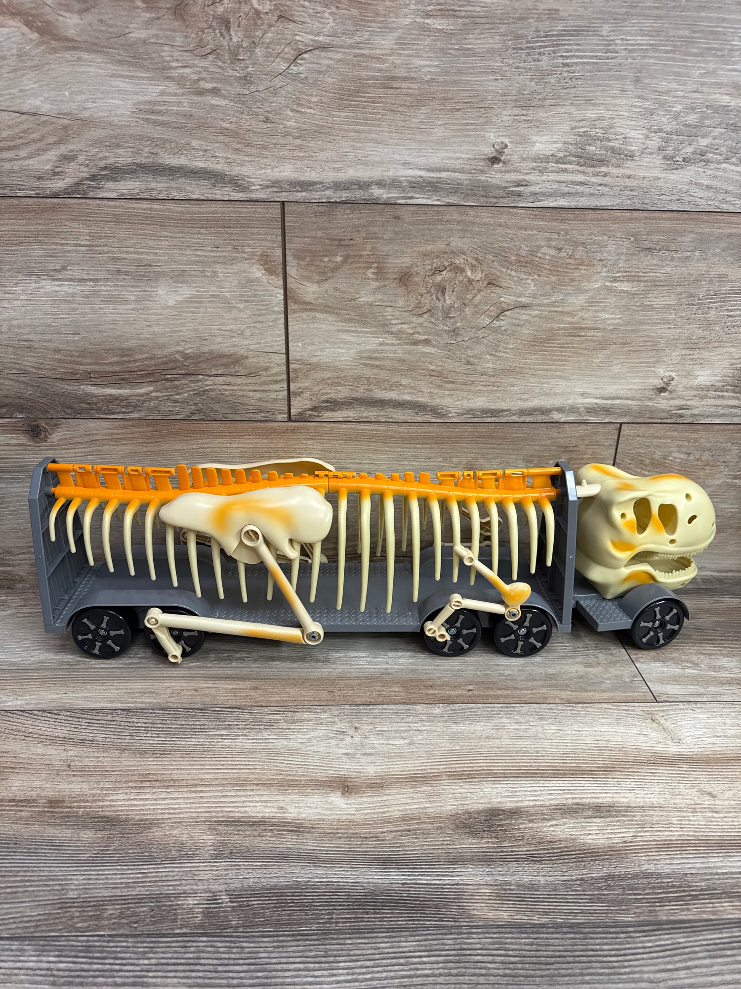 Kid Galaxy Skeleton Dinosaur Hauler Transporter Truck