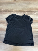 Black kids' short-sleeve t-shirt on wooden surface, ideal for casual wear or resale