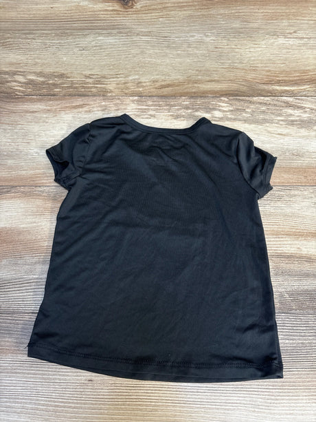 Black kids' short-sleeve t-shirt on wooden surface, ideal for casual wear or resale