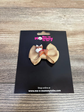 Tan ribbon bow with glittery reindeer hair clip for baby girls, festive holiday accessory