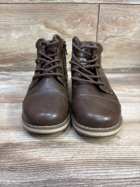 Front view of Sonoma Goods for Life Joshua brown lace-up boots showing stitched toes and light soles on wood flooring
