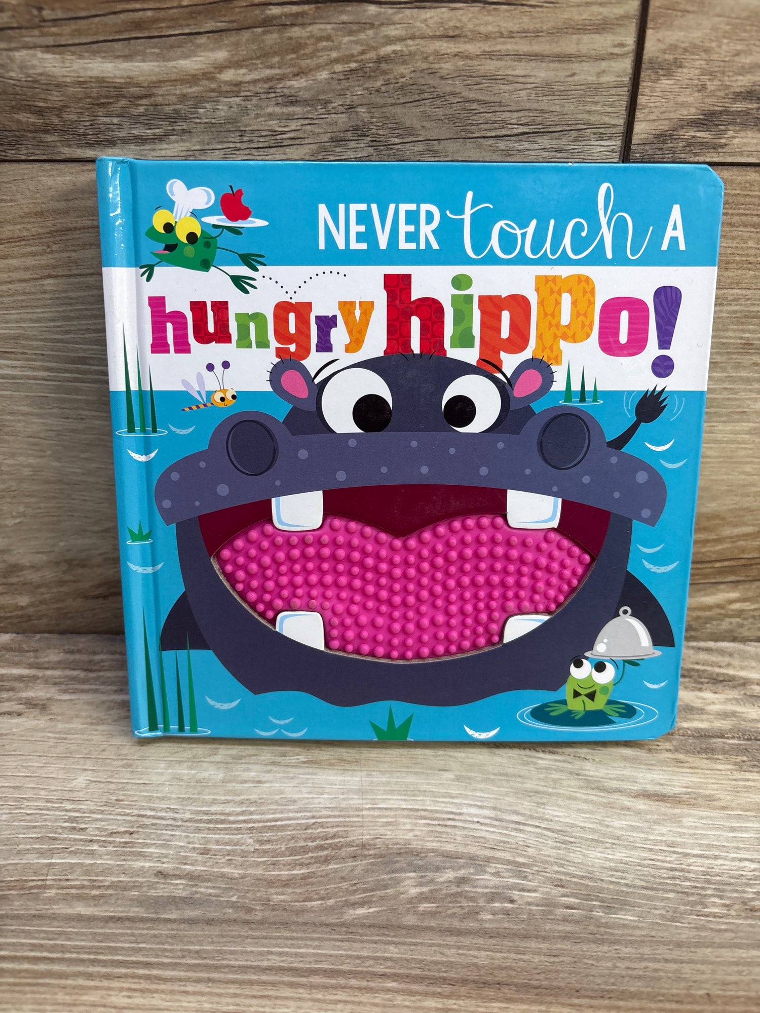 Never Touch a Hungry Hippo! Board Book