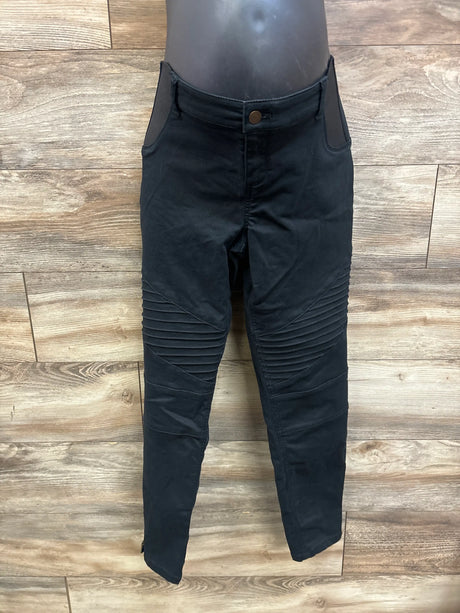 Front view of Isabel black maternity side panel jeggings showcasing ruched knee detailing on wood flooring