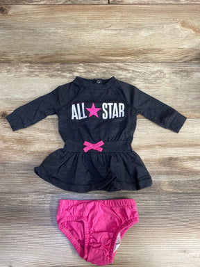 Baby girl long sleeve black dress with 'ALL STAR' print and pink diaper cover on wood background