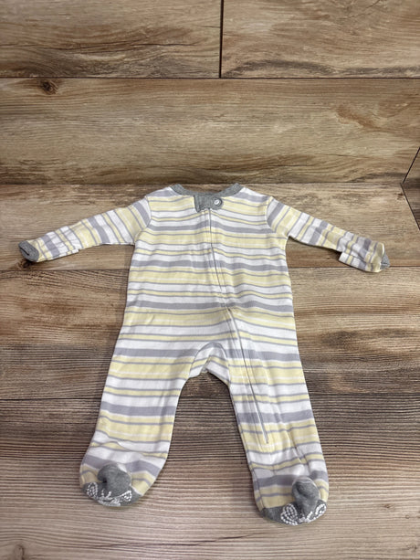 Front view of Burt’s Bees Baby striped organic sleeper with long sleeves, footed legs, and front zipper on a wood surface