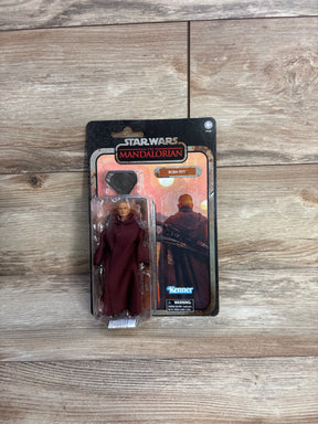 Front view of Star Wars The Mandalorian Boba Fett Kenner action figure in sealed blister card packaging on wood plank floor