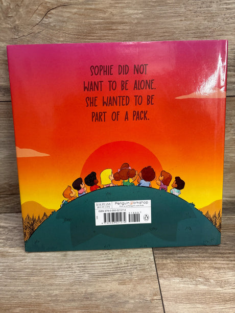 Back cover of First Night of Howlergarten hardcover book with children on a hill and text, Sophie wanted to be part of a pack