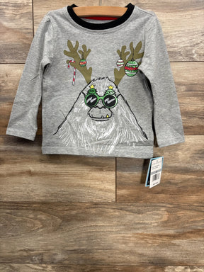 Gray kids shirt with festive yeti wearing sunglasses and reindeer antlers, holiday-themed design