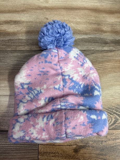 Front view of Disney Minnie Mouse tie-dye pom-pom beanie showcasing a blue pom-pom and pink, blue, and white knit pattern