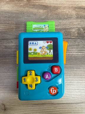 Fisher-Price Puppy’s Adventure blue toy handheld game for kids on wood background