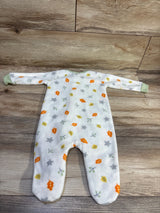 Flat lay of Koala baby blanket sleeper, white size 3-6m, with long sleeves, footed legs, and colorful leaf and star pattern