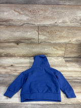 Back view of blue Wonder Nation toddler pullover hoodie size 2T showing hood and ribbed cuffs on wood background