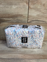 Front view of Hello Bello size 1 diapers (32 ct) showing printed pattern and clear plastic packaging on wood background