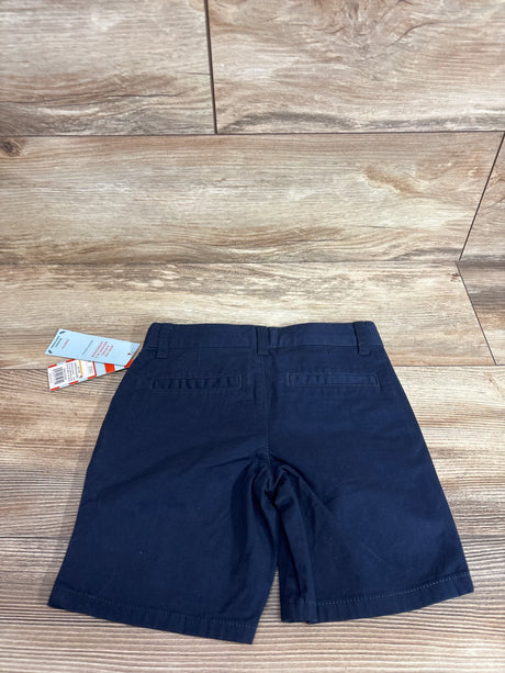 Front view of Cat and Jack navy toddler school uniform shorts showcasing elastic waistband and cuffed hem on white background