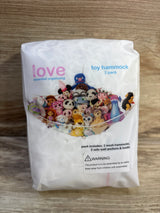 Front view of Lilly's Love toy hammock 2-pack showing mesh hammock filled with stuffed animals on wooden floor background