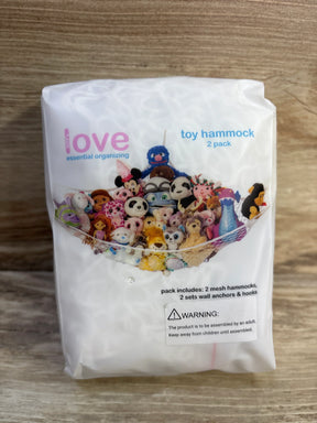 Front view of Lilly's Love toy hammock 2-pack showing mesh hammock filled with stuffed animals on wooden floor background