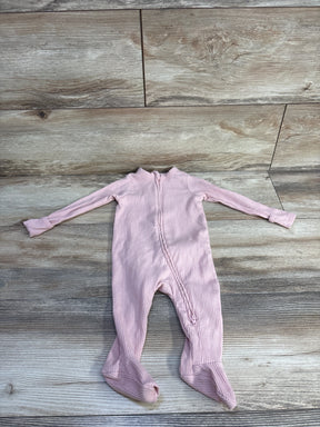 Front view of Old Navy pink ribbed footed sleeper with diagonal zipper and fold over cuffs on light wood background