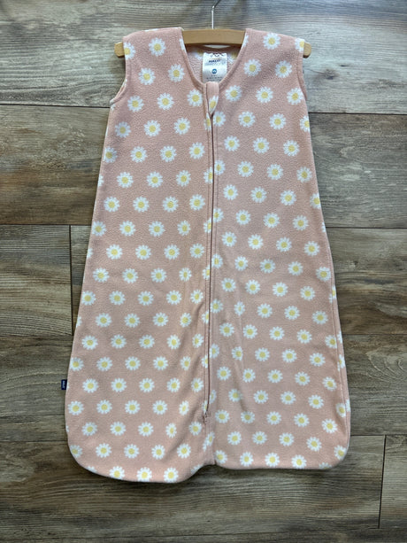 Front view of pink Halo SleepSack blanket for 6 to 12 months showcasing daisy print and front zipper on a wooden background