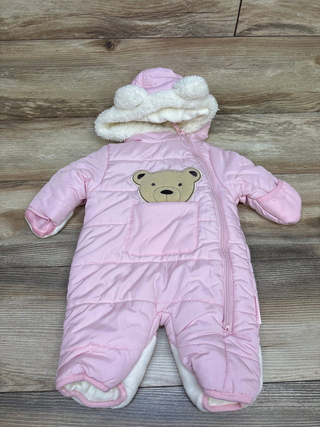 Front view of pink Wippette bear puffer bunting with bear ear hood and front pocket on wood floor