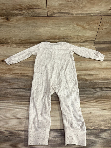 Front view of Carter’s ivory ribbed Henley coverall showcasing long sleeves and cuffed legs on a wood background