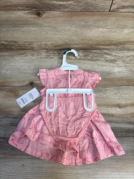 Pink baby dress with bunny print, size 3M, on hanger for resale
