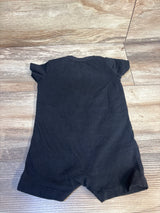 Black short sleeve baby romper on wood floor, children's clothing resale