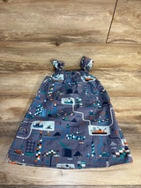 Gray baby dress with city map print, construction trucks, boats, and buildings on wood floor