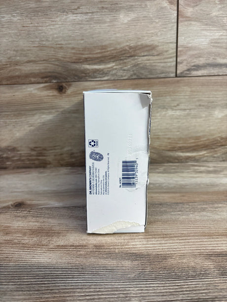 Side view of Dr. Brown's dishwasher basket box for narrow baby bottle parts with barcode and torn corner on wood background