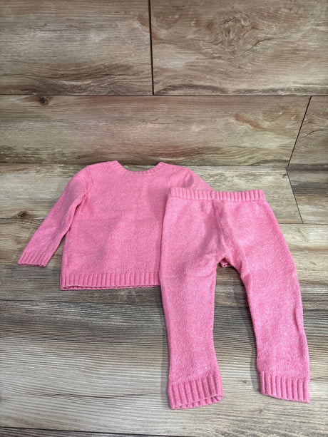Old Navy 2-piece pink SoSoft knit sweater and pants set for infants on a wood background.