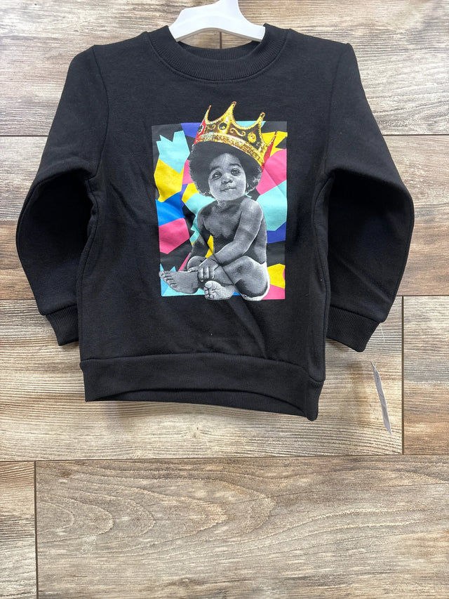 Black kids sweatshirt with graphic of baby wearing a crown and colorful background