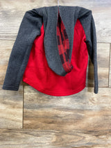 Red and gray long sleeve kids shirt with buffalo plaid detail on wooden background