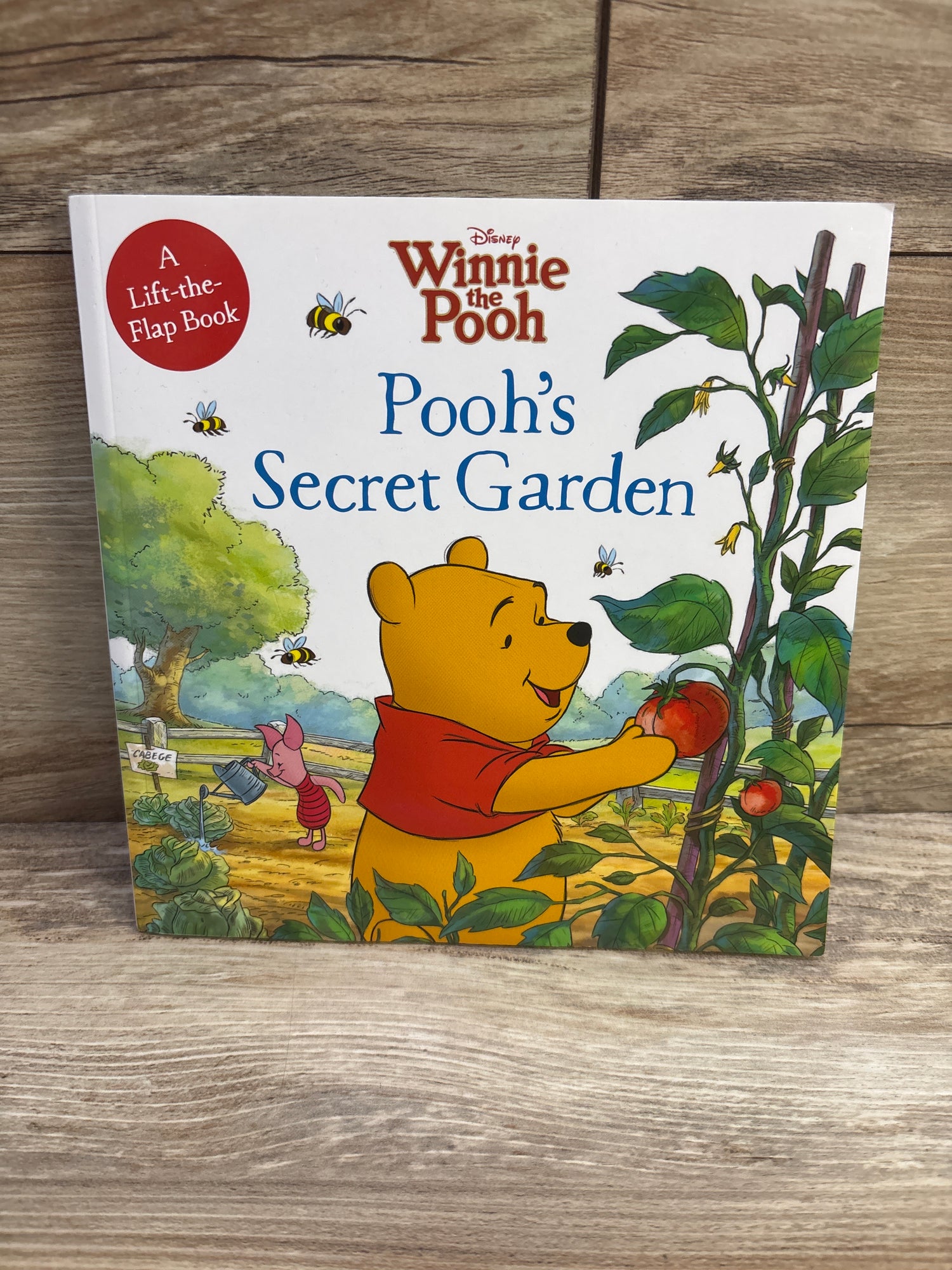 Disney Winnie the Pooh: Pooh's Secret Garden: A Lift-the-Flap Paperback Book