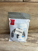Front view of NiHome child-proof refrigerator locks in sealed white package showing adhesive strap locks and release key on wooden surface