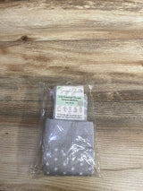 Snuggle Shield Luxe bamboo compression socks in gray with white polka dots, packaged on wooden surface
