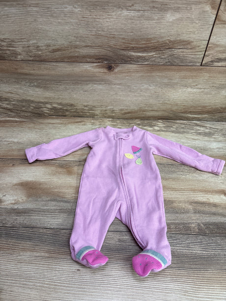 Front view of Just One You pink waffle knit newborn sleeper showcasing long sleeves, front zipper, and footed legs